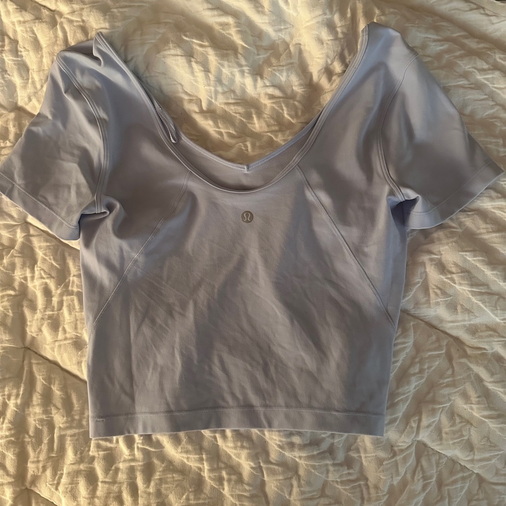 lululemon size 6 (i think?) but can fit a size 4 align t-shirt in periwinkle